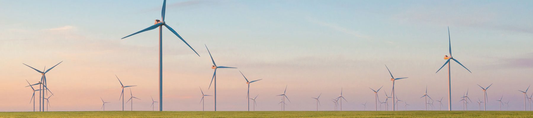 Online Master of Energy and Environmental Management image of wind turbine natural resources energy field. 